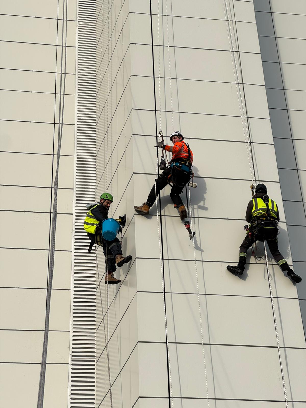 Multiple technicians operating simultaneously to support efficient façade works.